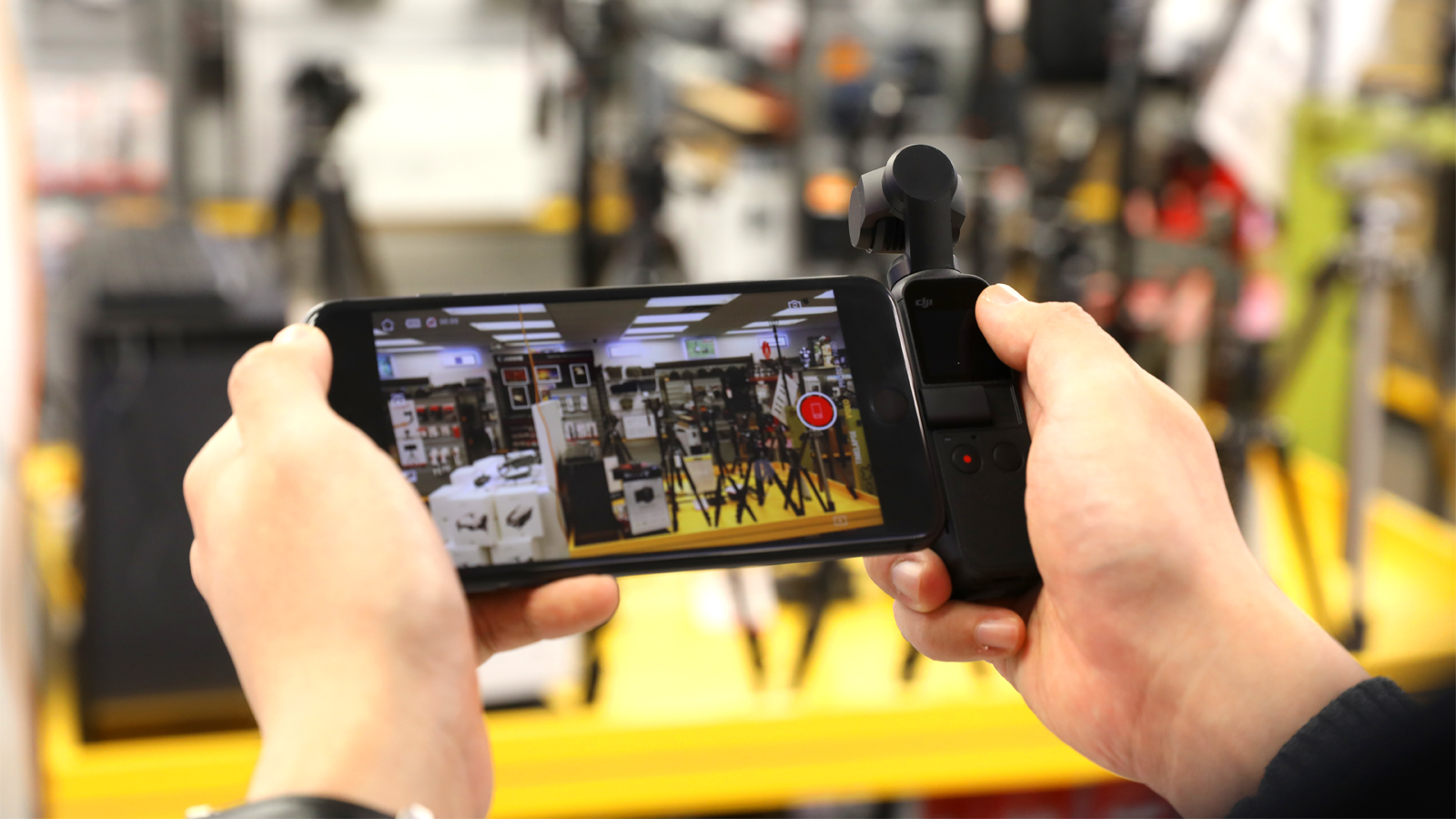 The DJI Osmo Pocket attached to smartphone