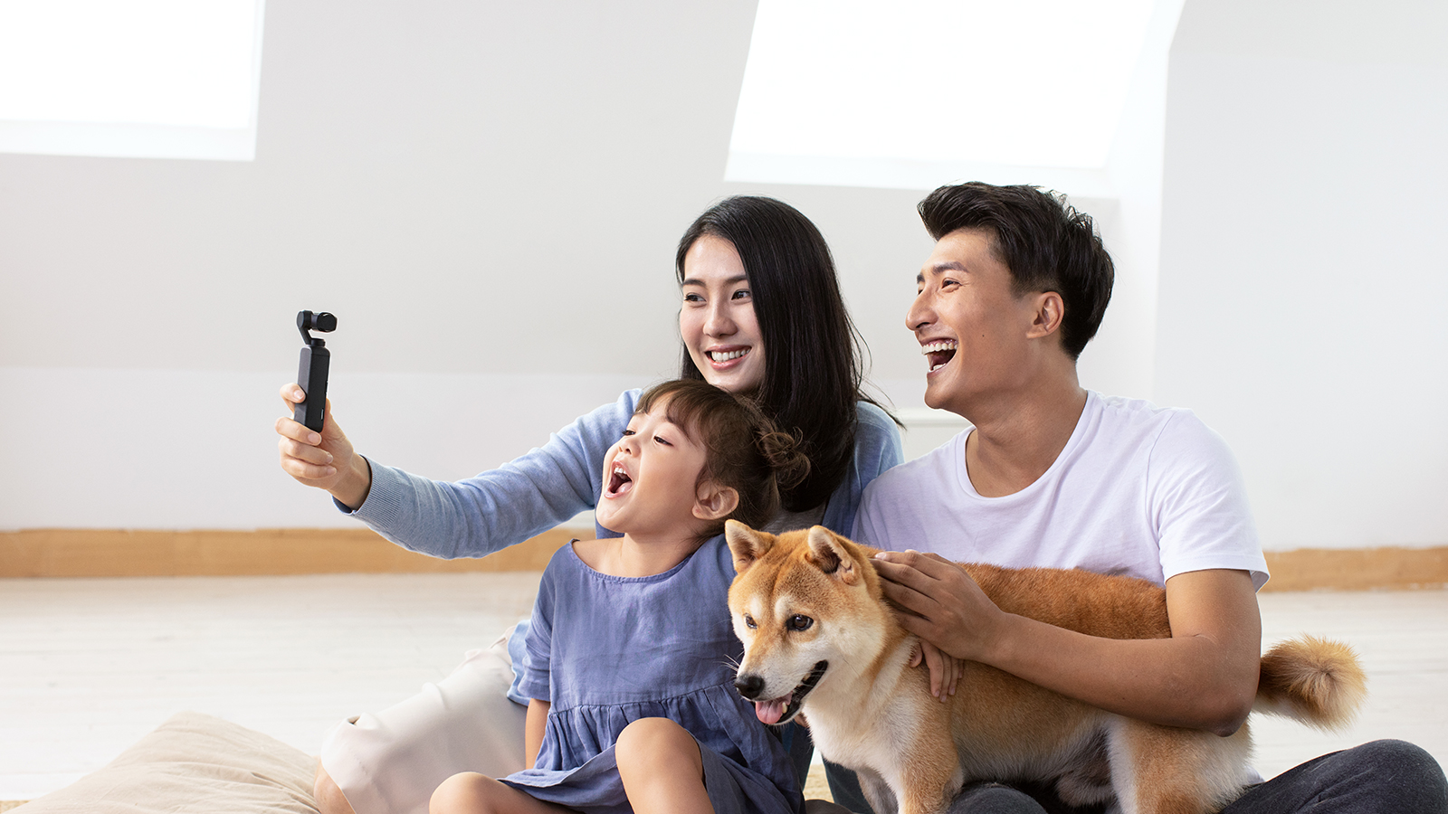 Family taking selfie with the DJI Osmo Pocket